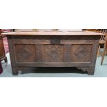 An 18th century oak blanket chest with carved panel front, 71cm high x 151cm wide x 63cm deep