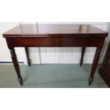A Victorian mahogany fold over tea table shaped octagonal supports, 76cm high x 107cm wide x 52cm