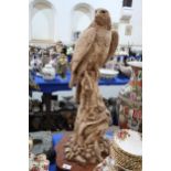 A large resin figure of a golden eagle Condition Report:Available upon request