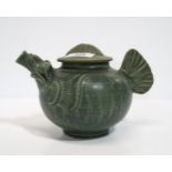 A celadon glazed grotesque teapot  Condition Report:Available upon request