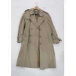 A Burberry raincoat Condition Report:No condition report available.