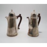 A George VI silver cafe au lait set, by Edward & Sons, London of tapering cylindrical form,