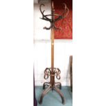 A Victorian bentwood coat stand with scrolled quadrupedal base, 197cm high Condition Report: