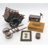 A leather-covered travel inkwell, framed silhouette miniature, hand-crank music box, Glasgow