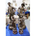 A large pair of spelter figures and another smaller Condition Report:Available upon request