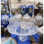 A large cut lead crystal bowl on stand together with a pair of cut glass lustres Condition Report: