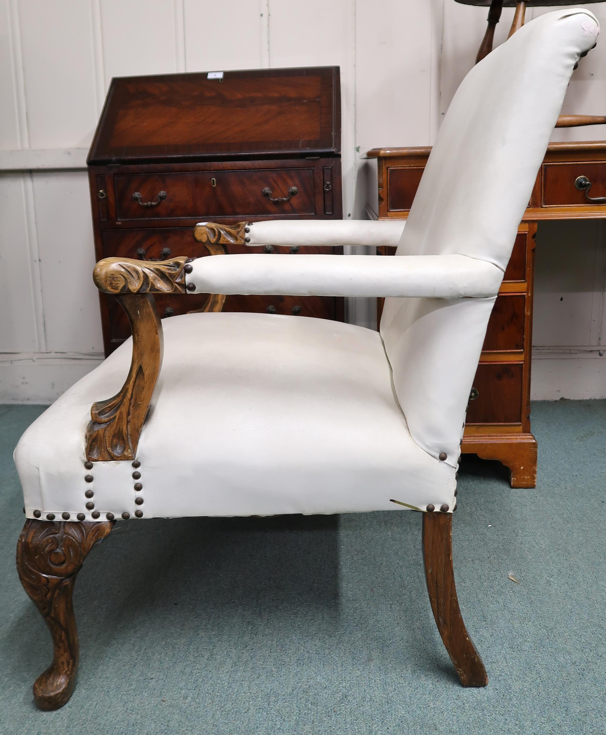 An early 20th century open armchair with white vinyl upholstery on carved cabriole supports, 93cm - Image 3 of 3