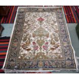 A pair 20th century wool tree of life pattern rugs with floral foliate border, 228cm long x 171cm