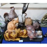 A Mike Lythgoe bird group, pottery chickens and cats and other figures Condition Report:No condition