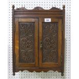 A stained oak smoker's cabinet, measuring approx. 46cm high x 33cm wide x 17cm deep Condition