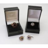 A 9ct gold garnet cluster ring, size O, together with a 9ct sapphire and cz cluster ring weight