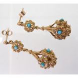 A pair of 9ct gold and turquoise drop earrings, length 3.5cm, weight 7.7gms Condition Report: