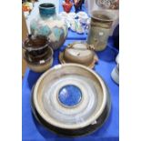 A collection of Alex Leckie studio ceramics including a dish with central blue enamel centre, signed