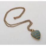A 15ct gold pearl and turquoise heart pendant, weight 2.9gms, with a 9ct gold vintage chain,