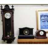 A 20th century mahogany cased Vienna style wall clock, A faux black slate mantle clock and another