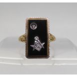 A 14k gold onyx and diamond Masonic signet ring, size O1/2, weight 2.9gms Condition Report:Available