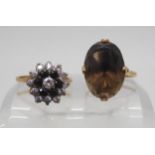 A 9ct gold sapphire and cubic zirconia cluster ring, size O1/2, and a 9ct retro smoky quartz ring