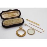 A boxed set of three 18ct gold shirt studs, weight 2.2gms, together with a 9ct brooch and two