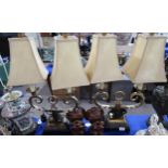 A pair of Neo classical table lamps and a pair of carved wood brackets Condition Report:Available