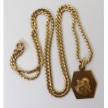 An 18ct gold Italian Cherub pendant, on a 52cm snake chain, weight 15.2gms Condition Report: