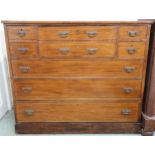 A Victorian mahogany secretaire chest of drawers with fall front writing drawer flanked by two short