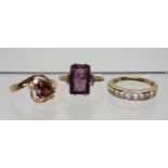 A gems TV trilliant cut garnet and citrine ring, size O, a 9ct clear gem set eternity ring size N1/