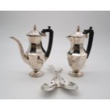 A George V silver cafe au lait set, by Joseph Gloster Ltd, Birmingham 1930, of faceted form, and two