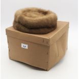 A mink fur pillbox hat, boxed Condition Report:Available upon request