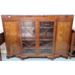 A 20th century mahogany breakfront bookcase with pair of astragal glazed doors flanked by cabinet