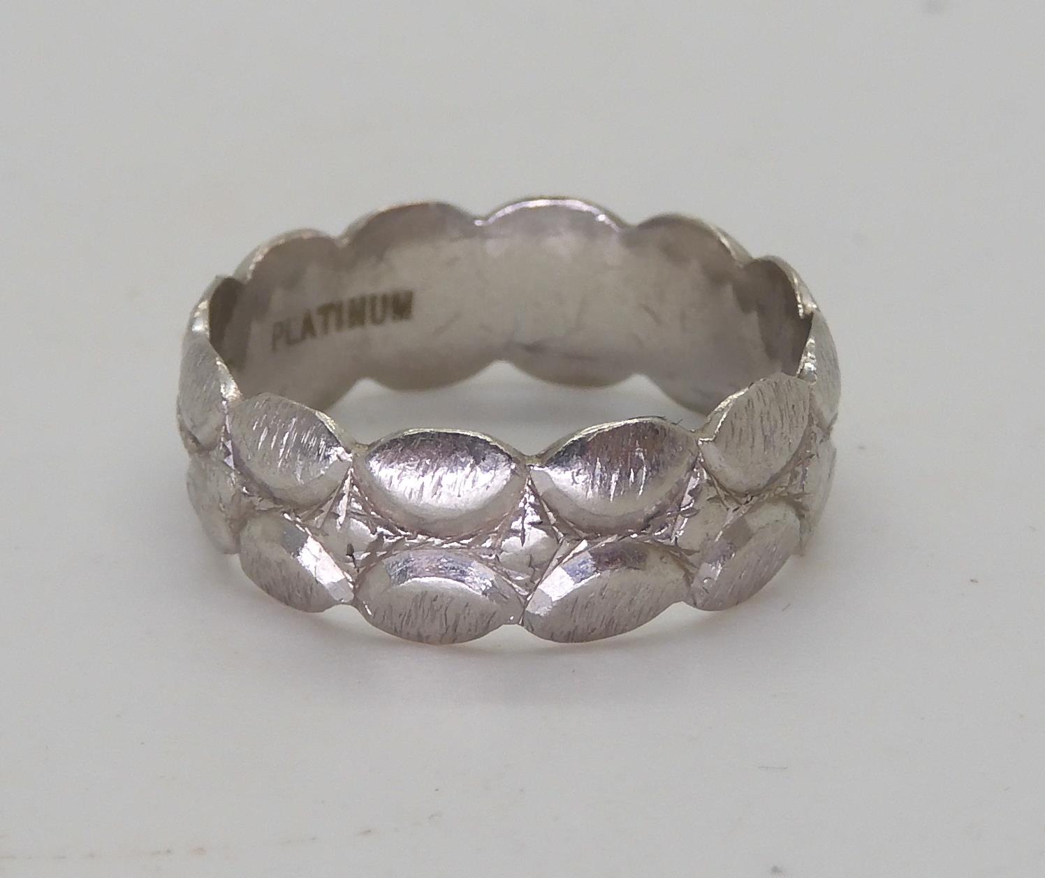 A platinum wedding ring, size O1/2, weight 6.3gms Condition Report:Available upon request