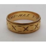 18ct gold wedding band, size N1/2, weight 4.5gms Condition Report:Inner band inscribed