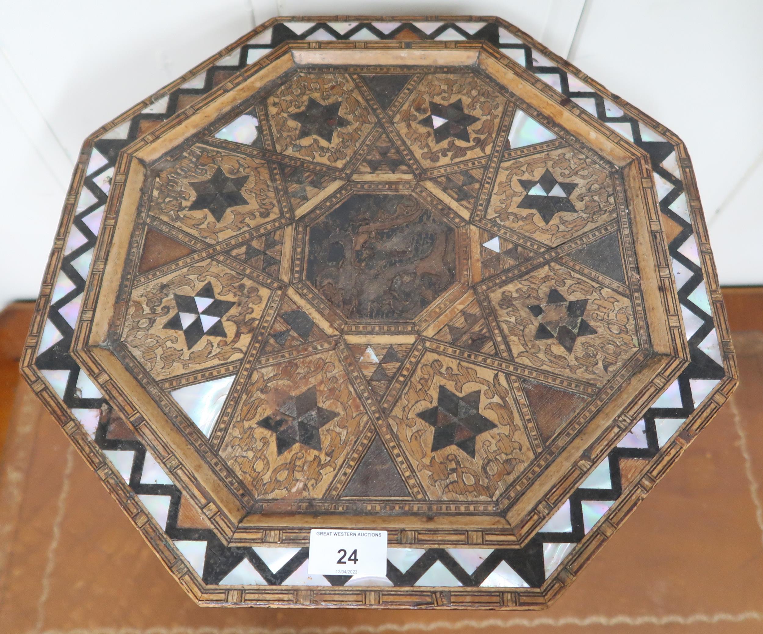 An Anglo-Moorish occasional table in the manner of Liberty & Co with mother of pearl and sample wood - Image 2 of 4