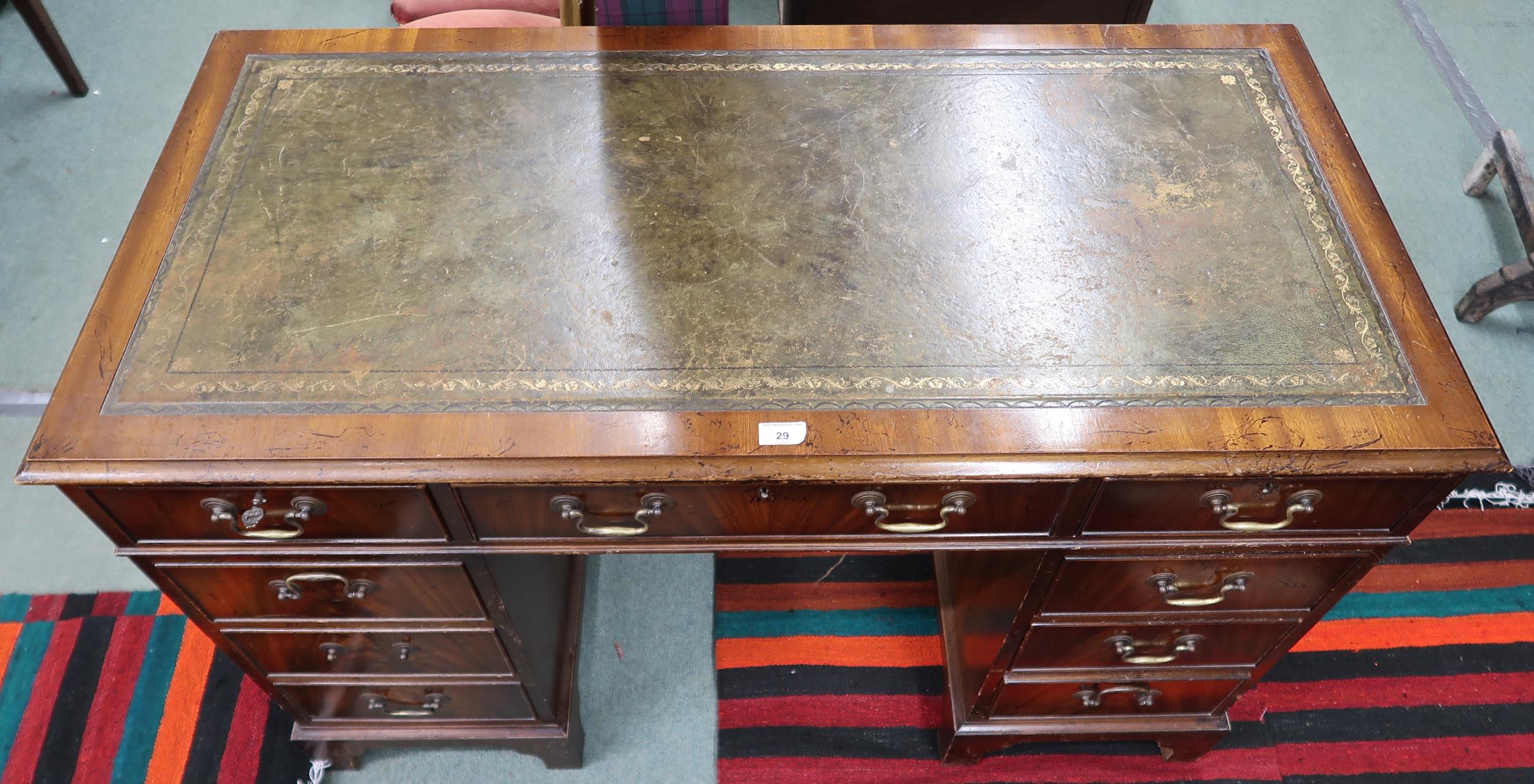 A 20th century mahogany pedestal writing desk with green leather skiver over single drawer flanked - Image 2 of 3