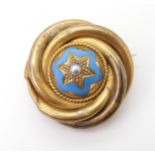 A Victorian yellow metal pearl and enamel star brooch, diameter 3cm, weight 11.1gms Condition