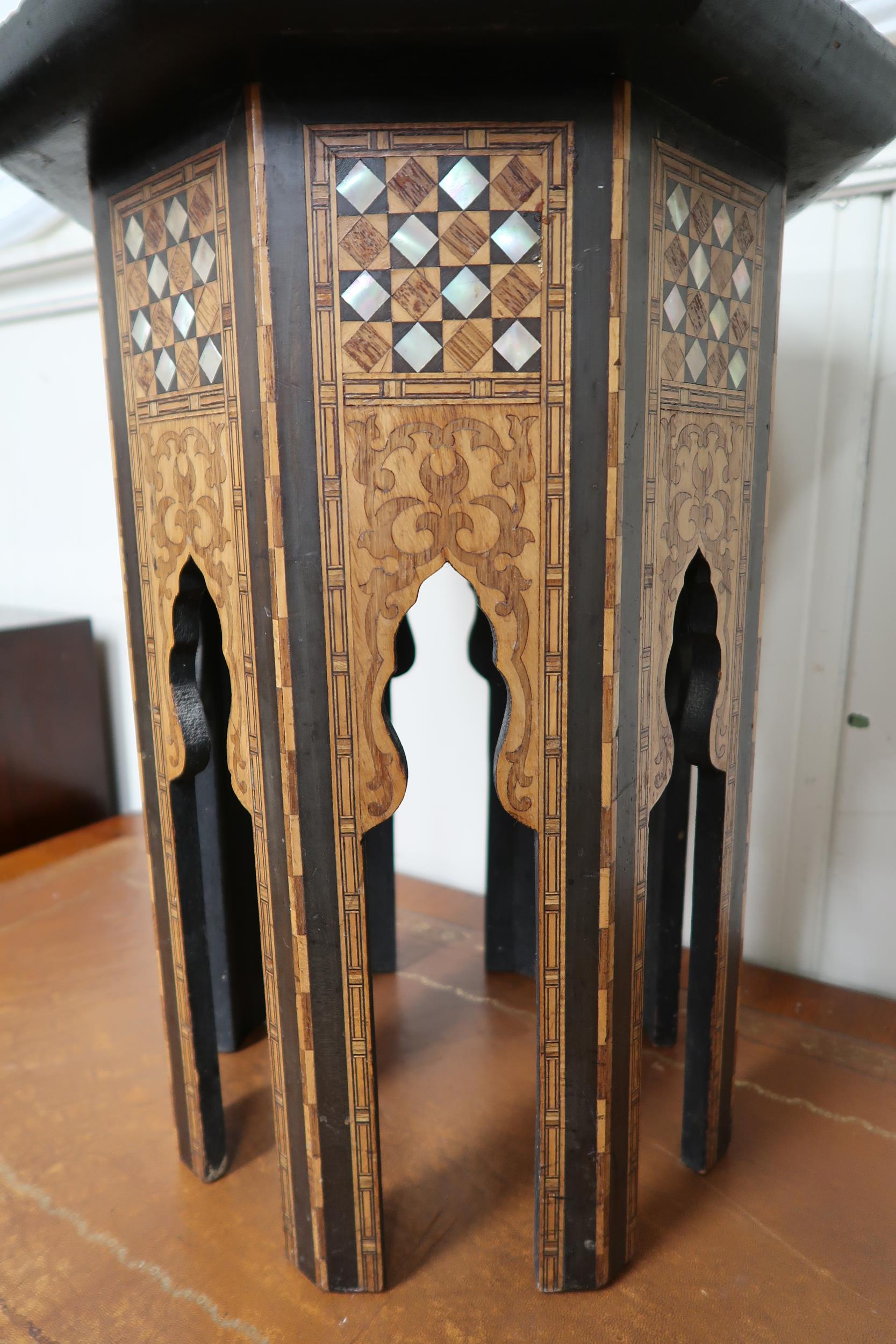 An Anglo-Moorish occasional table in the manner of Liberty & Co with mother of pearl and sample wood - Image 4 of 4