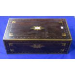 A Victorian rosewood and brass-inlaid writing slope, opening to reveal a fitted interior with