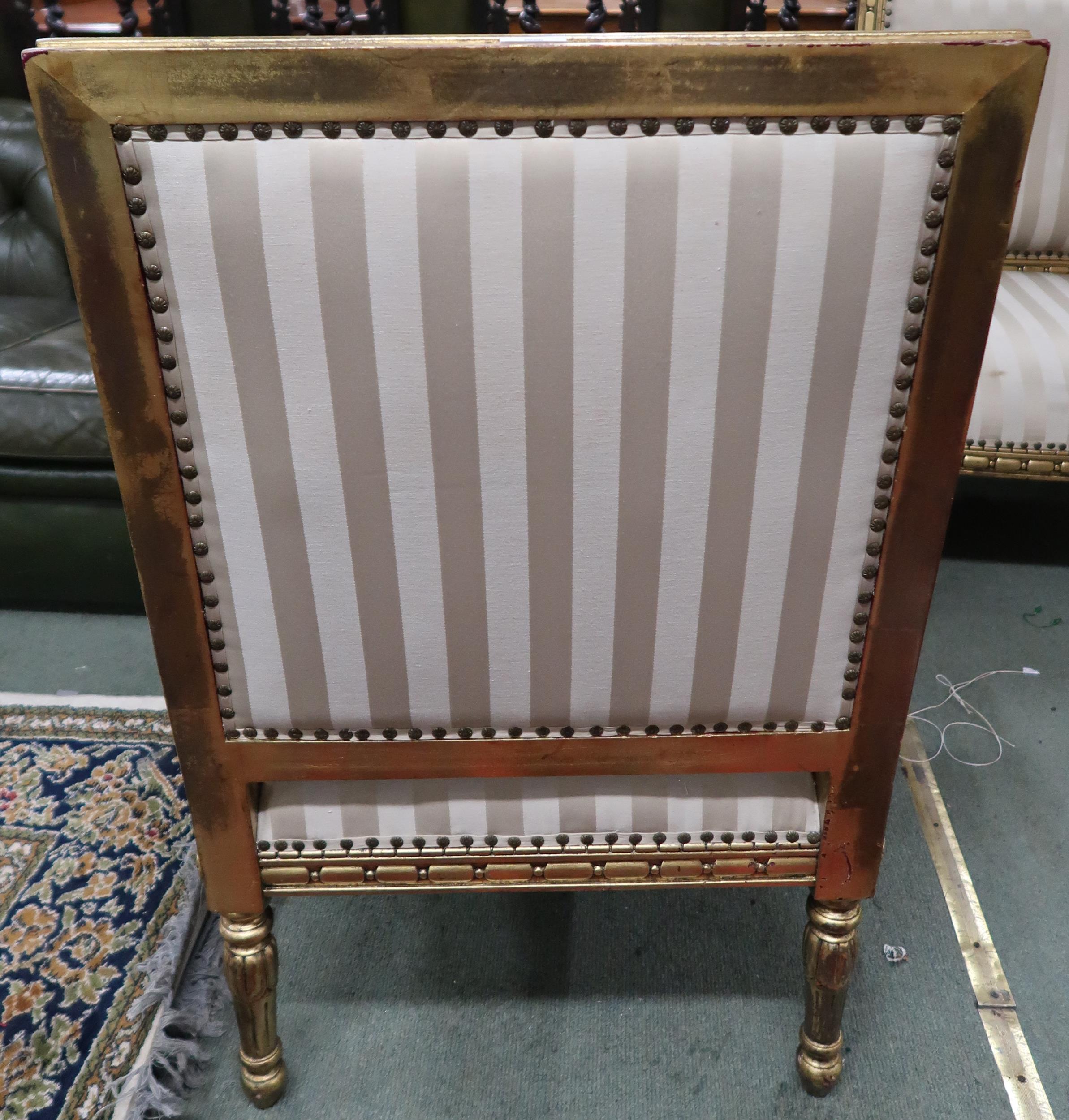 A pair of 20th century gilt framed continental style open armchairs with striped upholstery, 96cm - Image 3 of 3