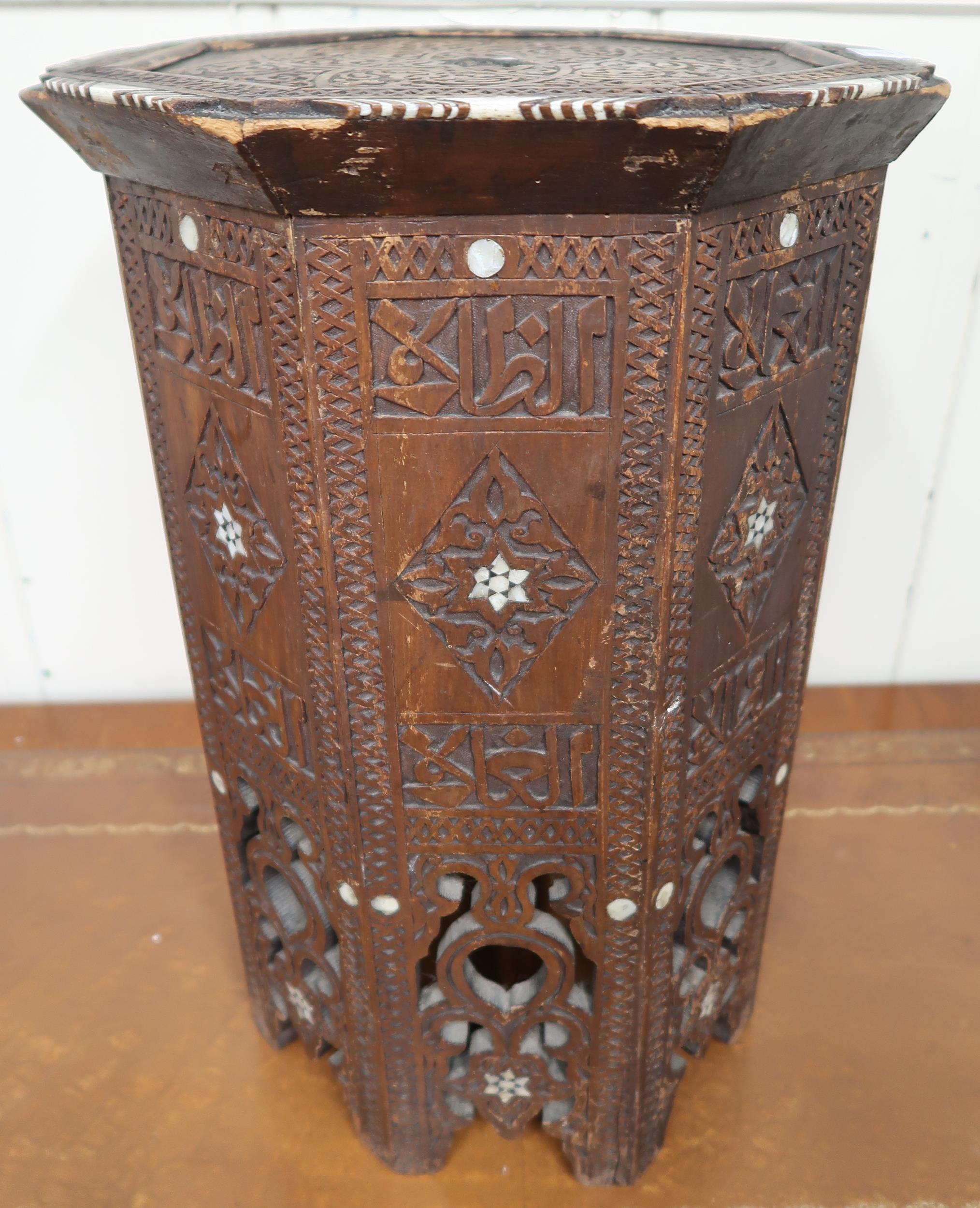 A 19th century Moorish occasional table with carved octagonal top with bone inlaid edges over carved - Image 3 of 3