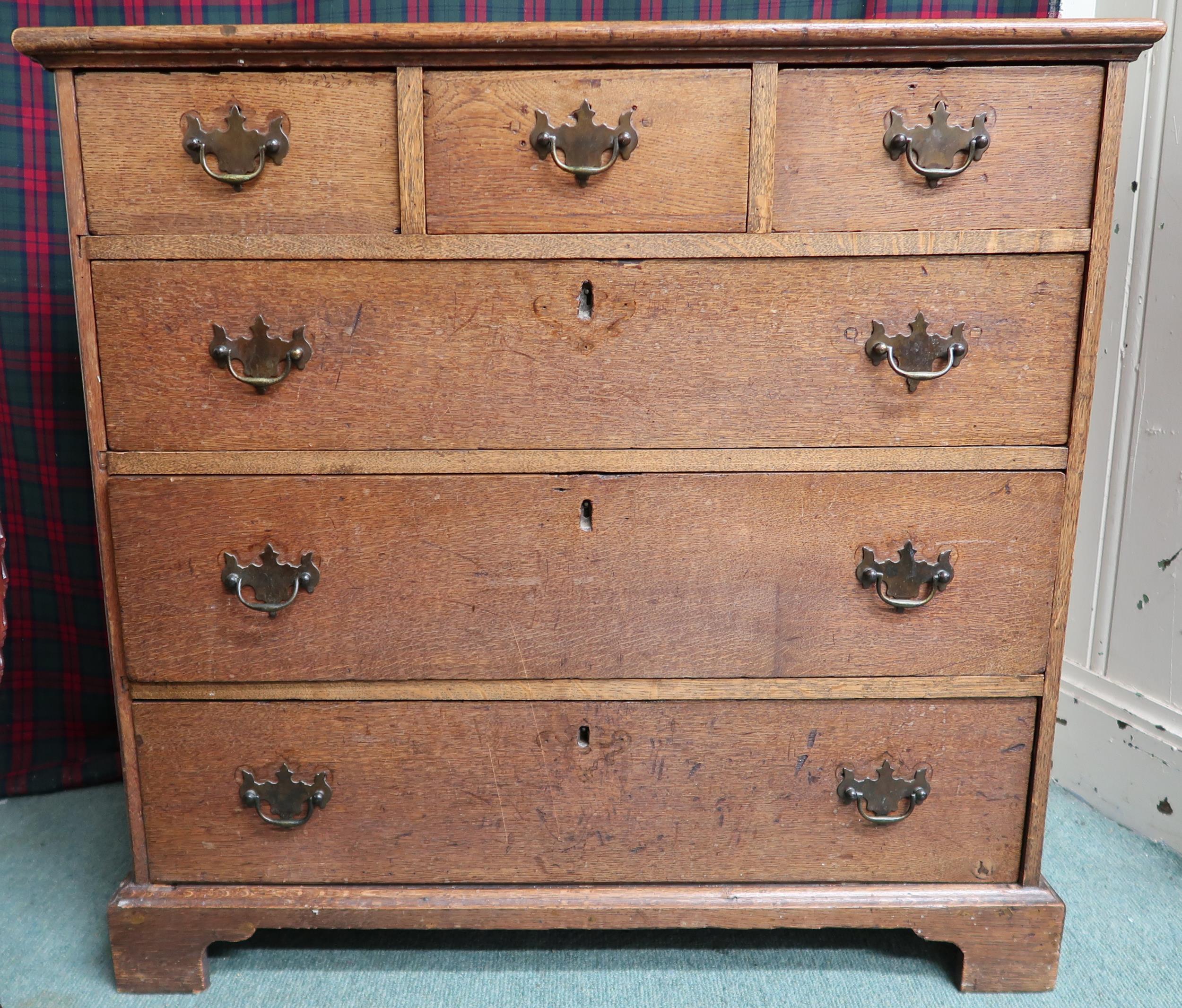 A Victorian oak chest of drawers with three short over three long drawers on plinth base, 87cm