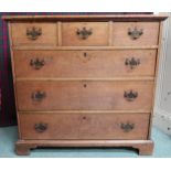 A Victorian oak chest of drawers with three short over three long drawers on plinth base, 87cm