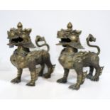 *WITHDRAWN* A pair of Chinese cast bronze Kylins, 20th century.