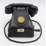 A Bakelite hand-crank Mining Table Telephone (for surface use) by Ericsson, dated 1949  Condition