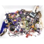 A string of craftsman ceramic beads, other statement bead necklaces, an Andre Duval compact, sent