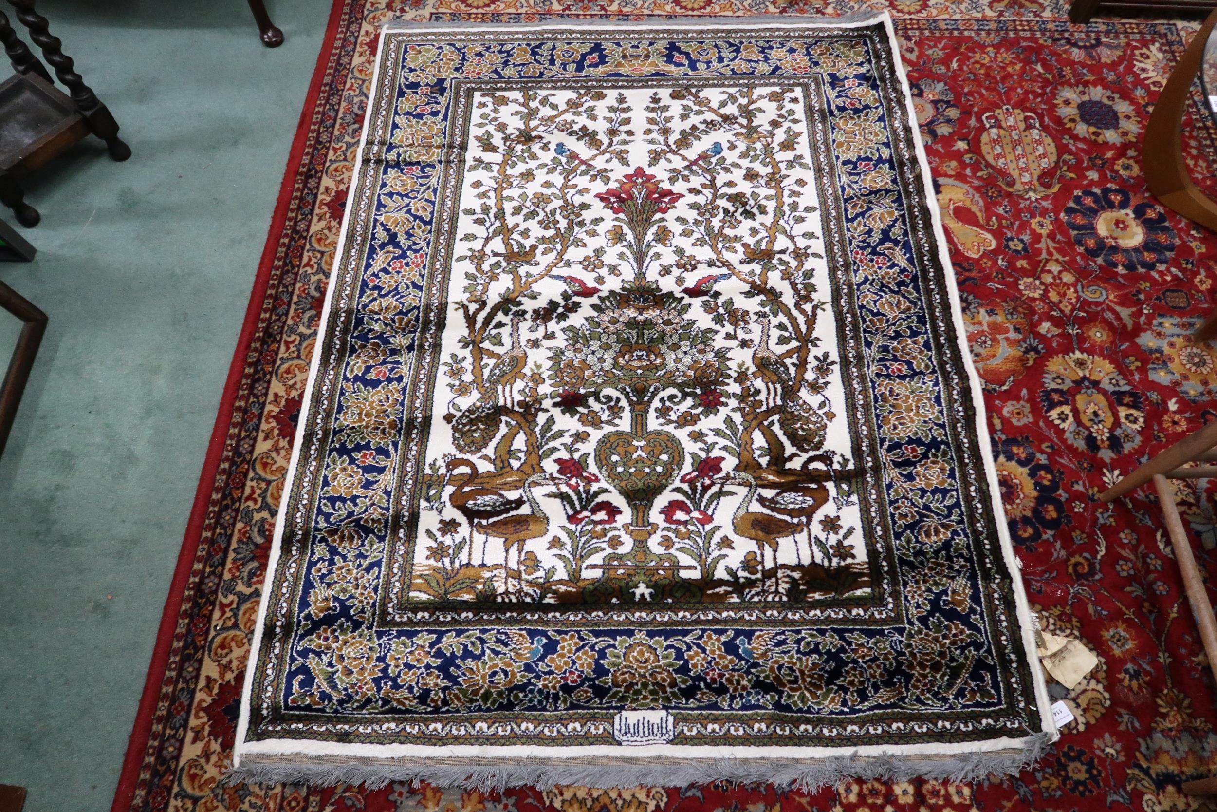 A pair 20th century wool tree of life pattern rugs with floral foliate border, 180cm long x 133cm - Image 2 of 6