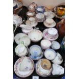 A collection of Chinese and English porcelain including a blue and white tea cup decorated with