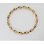 A 9ct gold Italian made twist bangle, weight 5.9gms Condition Report:Available upon request