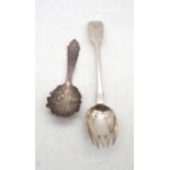A Victorian silver caddy spoon, in the form of an acanthus leaf, maker's mark obscured, and a