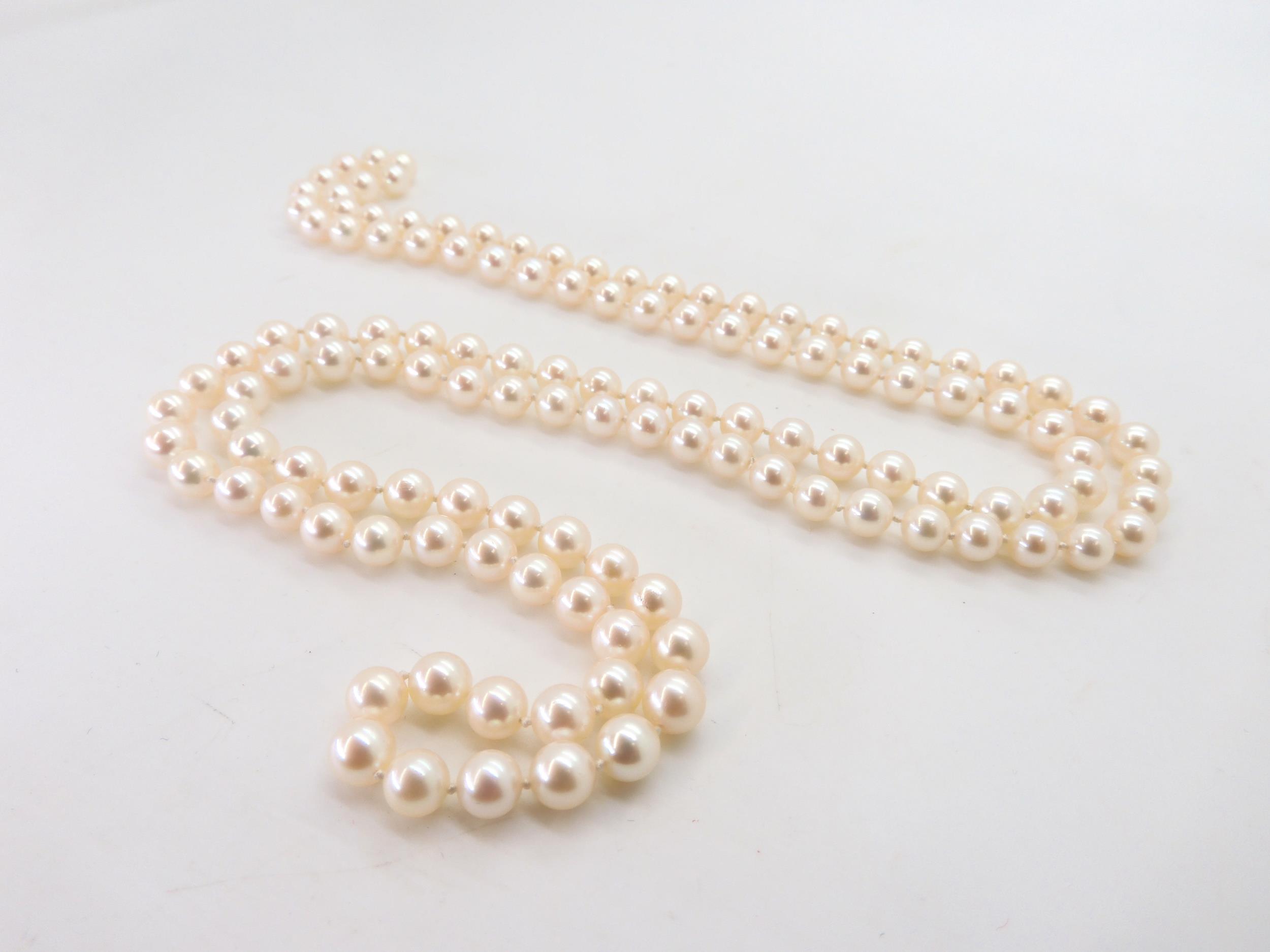 An opera length of cultured pearls, each pearl approx 6mm, approx total length 89cm, weight 44.