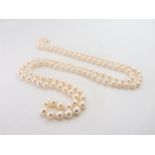 An opera length of cultured pearls, each pearl approx 6mm, approx total length 89cm, weight 44.