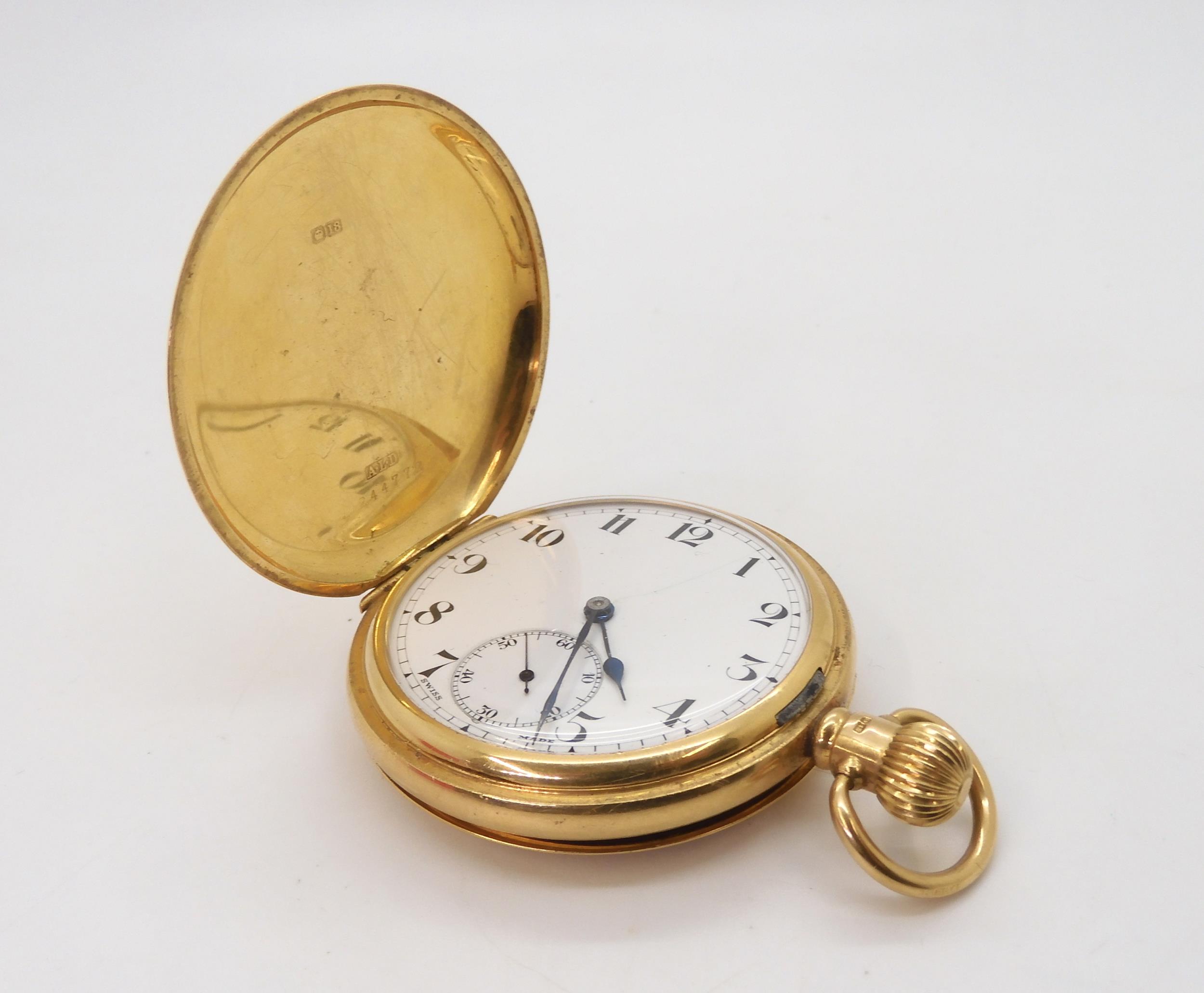 An 18ct gold full hunter pocket watch, diameter 5cm, the inner dust cover inscribed with the date